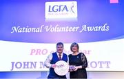 21 February 2020; Galway’s John McDermott is presented with the PRO of the Year award by Ladies Gaelic Football Association President Marie Hickey at the 2019 LGFA Volunteer of the Year awards night at Croke Park in Dublin. Photo by Piaras Ó Mídheach/Sportsfile