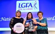21 February 2020; Maggie Skelton, from Aghyaran in Co. Tyrone, is presented with the Lulu Carroll award for the Overall Volunteer of the Year by Ladies Gaelic Football Association President Marie Hickey, left, and Angela Carroll, mother of the late Lulu Carroll at the 2019 LGFA Volunteer of the Year awards night at Croke Park in Dublin. Photo by Piaras Ó Mídheach/Sportsfile