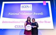 21 February 2020; Ciara Lane from Louth, and representing the Calgary Chieftains Club in Canada, is presented with the International Volunteer of the Year award by Ladies Gaelic Football Association President Marie Hickey at the 2019 LGFA Volunteer of the Year awards night at Croke Park in Dublin. Photo by Piaras Ó Mídheach/Sportsfile