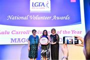 21 February 2020; Maggie Skelton, from Aghyaran in Co. Tyrone, is presented with the Lulu Carroll award for the Overall Volunteer of the Year by Ladies Gaelic Football Association President Marie Hickey, right, and Angela Carroll, mother of the late Lulu Carroll at the 2019 LGFA Volunteer of the Year awards night at Croke Park in Dublin. Photo by Piaras Ó Mídheach/Sportsfile