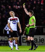 21 February 2020; Greg Sloggett of Dundalk is shown a yellow card by referee Damien MacGraith during the SSE Airtricity League Premier Division match between Shelbourne and Dundalk at Tolka Park in Dublin. Photo by Eóin Noonan/Sportsfile