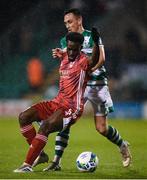 21 February 2020; Henry Ochieng of Cork City and Aaron McEneff of Shamrock Rovers during the SSE Airtricity League Premier Division match between Shamrock Rovers and Cork City at Tallaght Stadium in Dublin. Photo by Stephen McCarthy/Sportsfile