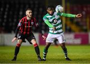 22 February 2020; Thomas Oluwa of Shamrock Rovers II in action against Shane Elworthy of Longford Town during the SSE Airtricity League First Division match between Longford Town and Shamrock Rovers II at Bishopsgate in Longford. Photo by Stephen McCarthy/Sportsfile