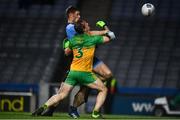 22 February 2020; Paul Mannion of Dublin scores his side's first goal despite the attention of Neil McGee of Donegal during the Allianz Football League Division 1 Round 4 match between Dublin and Donegal at Croke Park in Dublin. Photo by Sam Barnes/Sportsfile