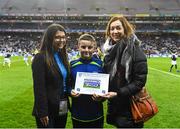 22 February 2020; Adam Long presented with his Outstanding Sportsmanship Award by Leona Ruane, assistant PRO Cumann na mBunscol, left, and Valenry Hedin, communications and marketing, with Allianz at half time during the Allianz Football League Division 1 Round 4 match between Dublin and Donegal at Croke Park in Dublin. Photo by Eóin Noonan/Sportsfile