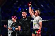 22 February 2020; Leah McCourt is declared victorious following her women's featherweight bout with Judith Ruis at Bellator Dublin in the 3 Arena, Dublin. Photo by David Fitzgerald/Sportsfile