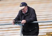 23 February 2020; A supporter reads the match programme ahead of the Allianz Hurling League Division 1 Group A Round 4 match between Tipperary and Westmeath at Semple Stadium in Thurles, Co Tipperary. Photo by Michael P Ryan/Sportsfile