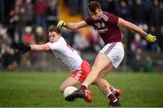 23 February 2020; Paul Conroy of Galway shoots to score his side's second goal despite the attempted challenge from Mark Bradley of Tyrone during the Allianz Football League Division 1 Round 4 match between Galway and Tyrone at Tuam Stadium in Tuam, Galway.  Photo by David Fitzgerald/Sportsfile