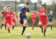23 February 2020; Mason Melia of DDSL in action against Dylan O'Sullivan of Cork SL during the U13 SFAI Subway Liam Miller Cup National Championship Final match between Cork SL and DDSL at Mullingar Athletic FC in Gainestown, Co. Westmeath. Photo by Eóin Noonan/Sportsfile