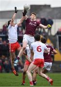 23 February 2020; Tom Flynn of Galway in action against Colm Cavanagh of Tyrone during the Allianz Football League Division 1 Round 4 match between Galway and Tyrone at Tuam Stadium in Tuam, Galway.  Photo by David Fitzgerald/Sportsfile