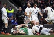 23 February 2020; Robbie Henshaw of Ireland dives over to score his side's second try despite the tackle of Ben Youngs of England during the Guinness Six Nations Rugby Championship match between England and Ireland at Twickenham Stadium in London, England. Photo by Ramsey Cardy/Sportsfile