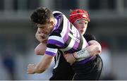 24 February 2020; Thomas Costello of Terenure College is tackled by James Conroy of Cistercian College Roscrea during the Bank of Ireland Leinster Schools Junior Cup Second Round match between Cistercian College Roscrea and Terenure College at Energia Park in Dublin. Photo by Piaras Ó Mídheach/Sportsfile