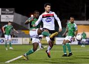 24 February 2020; Joseph Olowu of Cork City in action against Patrick Hoban during the SSE Airtricity League Premier Division match between Dundalk and Cork City at Oriel Park in Dundalk, Louth. Photo by Seb Daly/Sportsfile