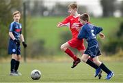 23 February 2020; Danny Miskella of Cork SL is tackled by Conor Lougheed of DDSL during the U13 SFAI Subway Liam Miller Cup National Championship Final match between Cork SL and DDSL at Mullingar Athletic FC in Gainestown, Co. Westmeath. Photo by Eóin Noonan/Sportsfile