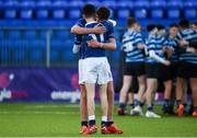 25 February 2020; Dejected St Mary's College players, Seán Murray-Norton, left, and Andrew Sparrow embrace after the Bank of Ireland Leinster Schools Junior Cup Second Round match between St Vincent’s Castleknock College and St Mary’s College at Energia Park in Dublin. Photo by Daire Brennan/Sportsfile