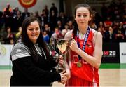 27 February 2020; Niamh Tolan of Virginia College is presented with the cup by Louise O'Loughlin of Basketball Ireland following the Basketball Ireland All-Ireland Schools U16A Girls League Final between SMGS Blarney and Virginia College, Cavan at National Basketball Arena in Dublin. Photo by Eóin Noonan/Sportsfile