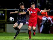 28 February 2020; Luke McNally of St Patrick's Athletic in action against Aaron Dobbs of Shelbourne during the SSE Airtricity League Premier Division match between Shelbourne and St Patrick's Athletic at Tolka Park in Dublin. Photo by Michael P Ryan/Sportsfile
