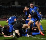 28 February 2020; Scott Fardy, hidden, celebrates with Leinster team-mates, including Luke McGrath and James Lowe after scoring his side's third try during the Guinness PRO14 Round 13 match between Leinster and Glasgow Warriors at the RDS Arena in Dublin. Photo by Ramsey Cardy/Sportsfile