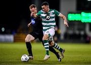 28 February 2020; Aaron Greene of Shamrock Rovers in action against Sean Hoare of Dundalk during the SSE Airtricity League Premier Division match between Shamrock Rovers and Dundalk at Tallaght Stadium in Dublin. Photo by Ben McShane/Sportsfile