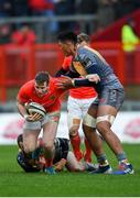 29 February 2020; Chris Farrell of Munster is tackled by Paul Asquith, left, and Sam Lousi of Scarlets during the Guinness PRO14 Round 13 match between Munster and Scarlets at Thomond Park in Limerick. Photo by Ramsey Cardy/Sportsfile