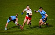 29 February 2020; Colm Cavanagh of Tyrone in action against Brian Howard and Seán Bugler of Dublin  during the Allianz Football League Division 1 Round 5 match between Tyrone and Dublin at Healy Park in Omagh, Tyrone. Photo by Oliver McVeigh/Sportsfile