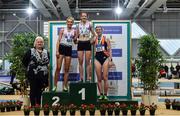 29 February 2020; Athletics Ireland President Georgina Drumm, left, with Senior Women's 3000m medallists, from left, Niamh Allen of Crusaders AC, Dublin, silver, Ciara Wilson of DMP AC, Wexford, gold, and Niamh Kearney of Sli Cualann AC, Wicklow, bronze, competing in the event during day one of the Irish Life Health National Senior Indoor Athletics Championships at the National Indoor Arena in Abbotstown in Dublin. Photo by Sam Barnes/Sportsfile