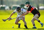 1 March 2020; Jarlath Collins of St Flannan's Ennis in action against Jack Cahalane of CBC Cork during the Munster GAA Dr. Harty Cup Final match between CBC Cork and St Flannan's Ennis at Mallow GAA Complex in Cork. Photo by Seb Daly/Sportsfile