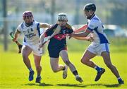 1 March 2020; Daire Burke of CBC Cork in action against Tony Butler, left, and Jarlath Collins of St Flannan's Ennis during the Munster GAA Dr. Harty Cup Final match between CBC Cork and St Flannan's Ennis at Mallow GAA Complex in Cork. Photo by Seb Daly/Sportsfile