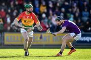 1 March 2020; David English of Carlow in action against Michael Dwyer of Wexford during the Allianz Hurling League Division 1 Group B Round 5 match between Wexford and Carlow at Chadwicks Wexford Park in Wexford. Photo by David Fitzgerald/Sportsfile