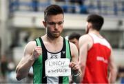 1 March 2020; Dean Adams of Ballymena and Antrim AC, celebrates with a tribute to late Irish and Shercock AC athlete Craig Lynch after winning the Senior Men's 60m event  Craig Lynch during Day Two of the Irish Life Health National Senior Indoor Athletics Championships at the National Indoor Arena in Abbotstown in Dublin. Photo by Eóin Noonan/Sportsfile