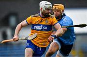 1 March 2020; Liam Corry of Clare clears under pressure from Eamon Dillon of Dublin during the Allianz Hurling League Division 1 Group B Round 5 match between Clare and Dublin at Cusack Park in Ennis, Clare. Photo by Ray McManus/Sportsfile