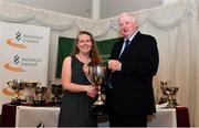 2 March 2020; Catriona Duffy of Leinster is presented the Bishop McFeeley Cup by Chairperson of the Athletics Ireland Juvenile Committee John McGrath during the Juvenile Star Awards 2019 at The Bridge Hotel in Tullamore, Offaly. Photo by Harry Murphy/Sportsfile