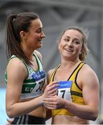 1 March 2020; Ciara Neville of Emerald AC, Limerick, left, with Joan Healy of Leevale AC, Cork, after winning the Senior Women's 60m during Day Two of the Irish Life Health National Senior Indoor Athletics Championships at the National Indoor Arena in Abbotstown in Dublin. Photo by Sam Barnes/Sportsfile