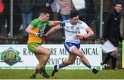 1 March 2020; Dessie Ward of Monaghan in action against Odhran McFadden Ferry of Donegal during the Allianz Football League Division 1 Round 5 match between Donegal and Monaghan at Fr. Tierney Park in Ballyshannon, Donegal. Photo by Oliver McVeigh/Sportsfile
