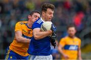 1 March 2020; Conor Madden of Cavan in action against Tony Kelly of Clare during the Allianz Football League Division 2 Round 5 match between Cavan and Clare at Kingspan Breffni Park in Cavan. Photo by Philip Fitzpatrick/Sportsfile