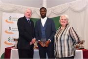 2 March 2020; Charles Okafor of Mullingar Harriers AC, Westmeath, is presented his Star Award trophy by Chairperson of the Athletics Ireland Juvenile Committee John McGrath and President of Athletics Ireland Georgina Drumm during the Juvenile Star Awards 2019 at The Bridge Hotel in Tullamore, Offaly. Photo by Harry Murphy/Sportsfile