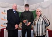 2 March 2020; Finn O'Neill of City of Derry Spartans AC, Derry, is presented his Star Award trophy by Chairperson of the Athletics Ireland Juvenile Committee John McGrath and President of Athletics Ireland Georgina Drumm during the Juvenile Star Awards 2019 at The Bridge Hotel in Tullamore, Offaly. Photo by Harry Murphy/Sportsfile