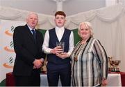 2 March 2020; Conor Hoade of Galway City Harriers is presented his Star Award trophy by Chairperson of the Athletics Ireland Juvenile Committee John McGrath and President of Athletics Ireland Georgina Drumm during the Juvenile Star Awards 2019 at The Bridge Hotel in Tullamore, Offaly. Photo by Harry Murphy/Sportsfile