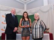 2 March 2020; Ava Rochford of Ennis Track AC, Clare, is presented her Star Award trophy by Chairperson of the Athletics Ireland Juvenile Committee John McGrath and President of Athletics Ireland Georgina Drumm during the Juvenile Star Awards 2019 at The Bridge Hotel in Tullamore, Offaly. Photo by Harry Murphy/Sportsfile