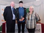 2 March 2020; Odhran Hamilton of Armagh AC, Armagh, is presented his Star Award trophy by Chairperson of the Athletics Ireland Juvenile Committee John McGrath and President of Athletics Ireland Georgina Drumm during the Juvenile Star Awards 2019 at The Bridge Hotel in Tullamore, Offaly. Photo by Harry Murphy/Sportsfile