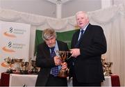 2 March 2020; Gerry Hayes of Ennis Track AC, Clare, is presented the Kennedy Cup by Chairperson of the Athletics Ireland Juvenile Committee John McGrath during the Juvenile Star Awards 2019 at The Bridge Hotel in Tullamore, Offaly. Photo by Harry Murphy/Sportsfile