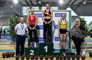 1 March 2020; Athletics Ireland President Georgina Drumm, right, with Senior Women's Pole Vault medallists, from left, Ellen McCartney of City of Lisburn AC, Down, silver, Ariel Elizabeth Lieghio of Clonliffe Harriers AC, Dublin, gold, and Clodagh Walsh of Abbey Striders AC, Cork, bronze, event during Day Two of the Irish Life Health National Senior Indoor Athletics Championships at the National Indoor Arena in Abbotstown in Dublin. Photo by Sam Barnes/Sportsfile