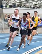 1 March 2020; John Travers of Donore Harriers, Dublin, left, and Hiko Haso Tonosa of Dundrum South Dublin AC, competing in the Senior Men's 3000m event during Day Two of the Irish Life Health National Senior Indoor Athletics Championships at the National Indoor Arena in Abbotstown in Dublin. Photo by Sam Barnes/Sportsfile