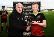 3 March 2020; Mark Birrane of IT Carlow is presented with the Man of the Match award by Paddy Gallagher, CFAI committee member, following the Rustlers CFAI Cup Final match between IT Sligo and IT Carlow at Athlone Town Stadium in Athlone, Co Westmeath. Photo by Stephen McCarthy/Sportsfile