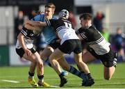 3 March 2020; Eddie Kelly of St Michael’s College is tackled by Donal Conroy, left, David O'Sullivan and Marcus Kiely of Newbridge College during the Bank of Ireland Leinster Schools Senior Cup Semi-Final match between St Michael’s College and Newbridge College at Energia Park in Donnybrook, Dublin. Photo by Ramsey Cardy/Sportsfile