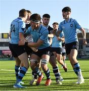 3 March 2020; Eddie Kelly, 14, celebrates with St Michael’s College team-mates Dylan Ryan and Chris Cosgrave after scoring a try during the Bank of Ireland Leinster Schools Senior Cup Semi-Final match between St Michael’s College and Newbridge College at Energia Park in Donnybrook, Dublin. Photo by Ramsey Cardy/Sportsfile