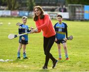 5 March 2020; Catherine, Duchess of Cambridge makes an attempt to hit a sliothar with a hurley during an engagement at Salthill Knocknacarra GAA Club in Galway during day three of her visit to Ireland. Photo by Sam Barnes/Sportsfile