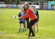 5 March 2020; Catherine, Duchess of Cambridge makes an attempt to hit a sliothar with a hurley during an engagement at Salthill Knocknacarra GAA Club in Galway during day three of her visit to Ireland. Photo by Sam Barnes/Sportsfile