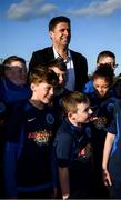 6 March 2020; FAI Interim Deputy Chief Executive Niall Quinn poses for a photograph with Darndale FC players after preforming the official opening of the new Darndale FC all-weather pitch at Darndale Park in Dublin. Photo by Stephen McCarthy/Sportsfile