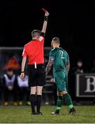 6 March 2020; Daniel Blackbyrne of Cabinteely is shown a straight red card by referee Alan Carey for a second half foul on Dara McGuinness of Shamrock Rovers II during the SSE Airtricity League First Division match between Cabinteely and Shamrock Rovers II at Stradbrook Road in Blackrock, Dublin. Photo by Piaras Ó Mídheach/Sportsfile